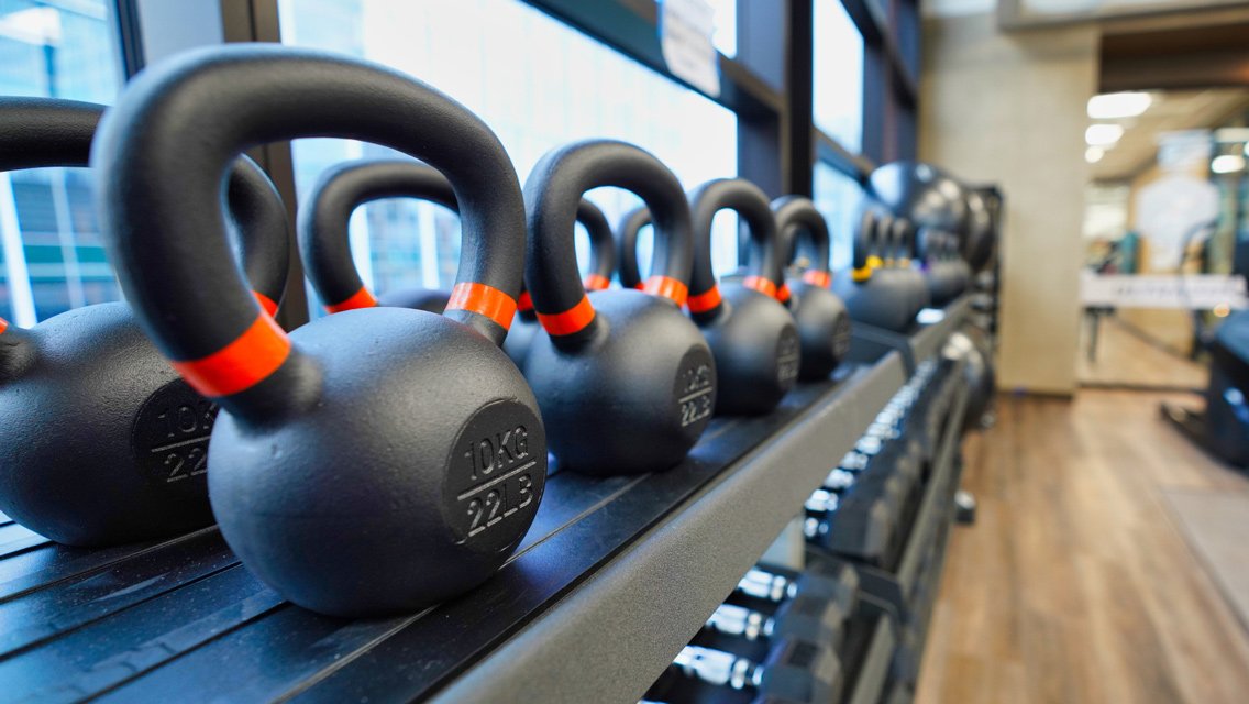 Set of free gym weights for sale including kettlebells, dumbbells and cast-iron weight plates